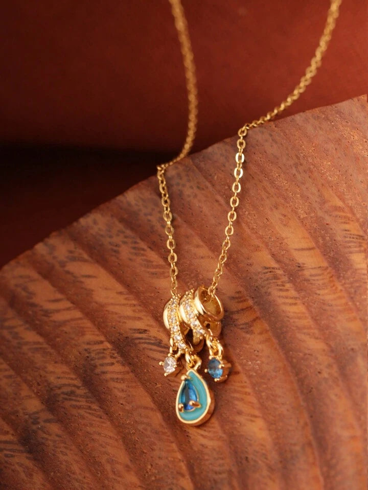 Ice Blue Teardrop Pendant Necklace – 18K Gold Tone
